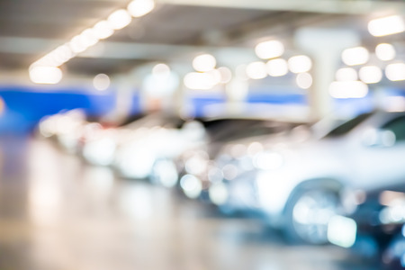 Blur of car in the car park backgroundの写真素材