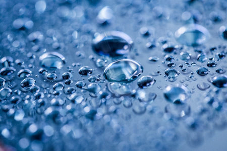 Water droplets on blue backgroundの写真素材