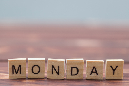 Alphabet Monday on old vintage wood backgroundの写真素材