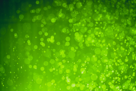 Abstract Green christmas Glitter Lights Defocused bokeh backgroundの写真素材