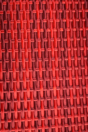 Detail of woven rattan in dark wood patternの写真素材