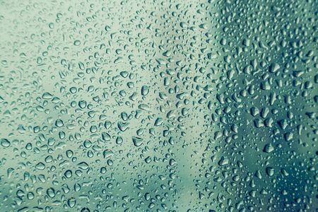 Water droplet on the window glass blackground
