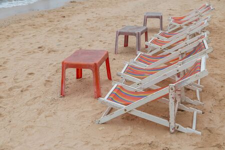 Beach bed on the beach welcome tourists to sit and relax nature backgroundの写真素材