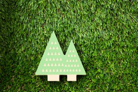 Artificial trees on artificial grass backgroundの写真素材