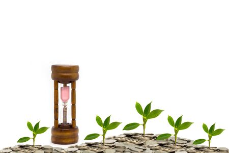 Wood grain hourglass on a white backgroundの写真素材