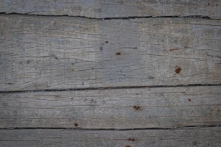 Old wood pattern with cracks and nails use for backgroundの写真素材