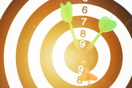 Successful business planning with a goal that has an arrow in the center of the target.