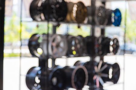 Blur of alloy wheels for cars at the service centerの写真素材