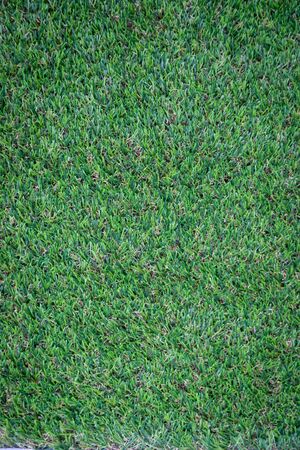 Green artificial grass floor nature backgroundの写真素材