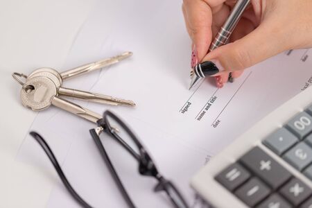 Sign a business contract with a key  background