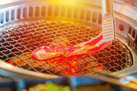 Japanese style grill slice Wagyu beef on the charcoalの写真素材