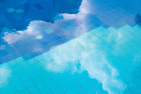 Reflection in the blue pool natural use for background
