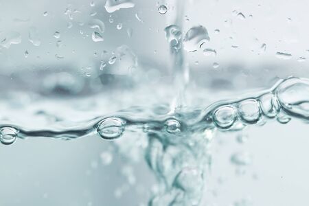 Bubbles in clean blue water ready to drink use for nature background