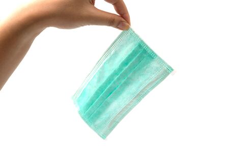 Medical mask for the prevention of germs that have been used on a white background.