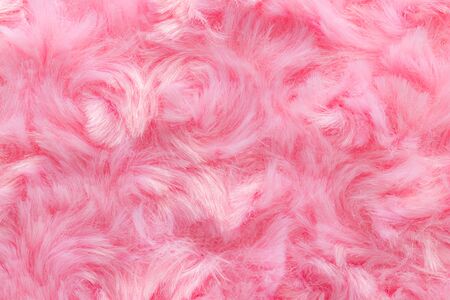 Pink luxury wool natural fluffy fur wool skin texture  close-up use for background and wallpaperの写真素材