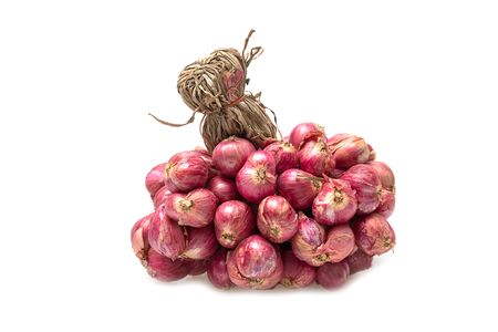 Thai shallot, spices used for cooking on a white backgroundの写真素材