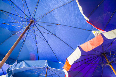 Umbrella cloth on the beach for tourists who come to the sea.の写真素材