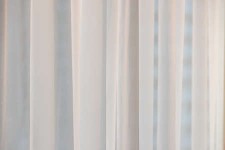 White curtains and morning sunlight nature backgroundの写真素材