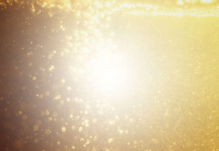 Glittering stars of blur gold  bokeh use for celebrate background