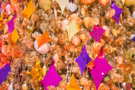 Celebrate Christmas by adorning the presents on the Christmas treeの写真素材