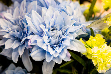 Colorful decorative artificial flowers for festivalsの写真素材