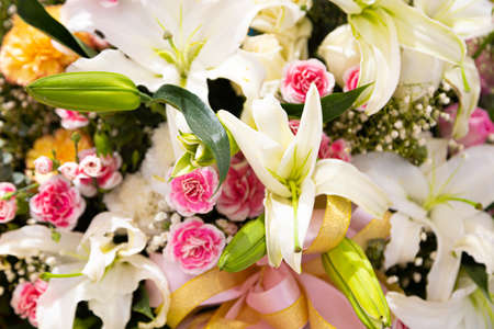 Colorful decorative artificial flowers for festivalsの写真素材