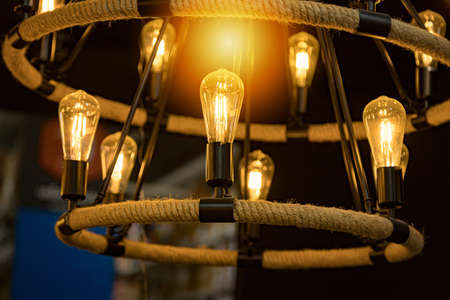 Warm orange light chandeliers for home decoration give you a bright glowの写真素材