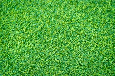 Artificial grass for decorating the garden to look natural backgroundの写真素材