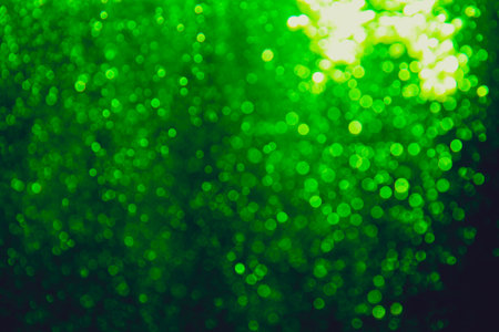 Abstract green bokeh luxury with black backgroundの写真素材