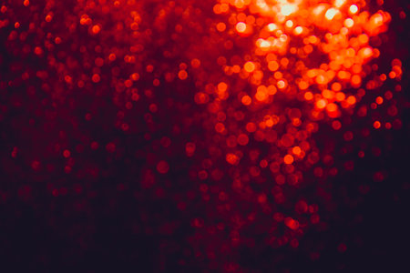 Abstract red bokeh luxury with black backgroundの写真素材