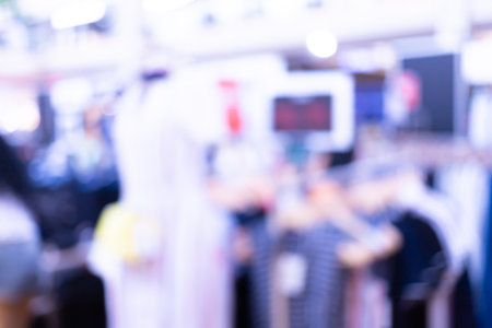 Blurred image walking shopping in a shopping mall stimulating the economyの写真素材