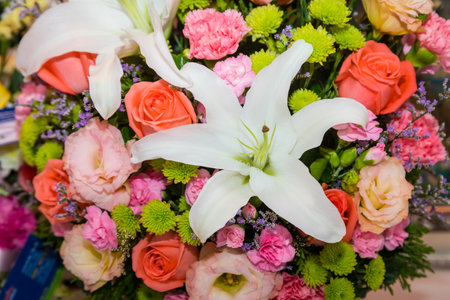 Bright summer floral arrangement background for special occasion celebrationsの写真素材