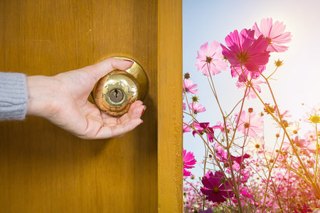 Handle the knob to open the door to entering an Office backgroundの写真素材