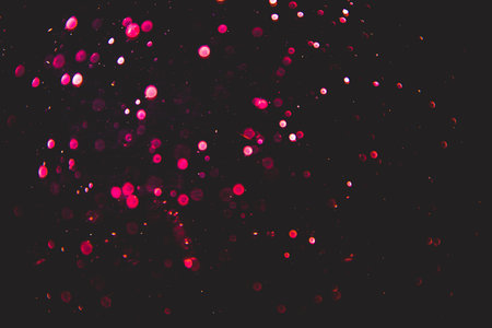 Abstract pink bokeh luxury with black backgroundの写真素材