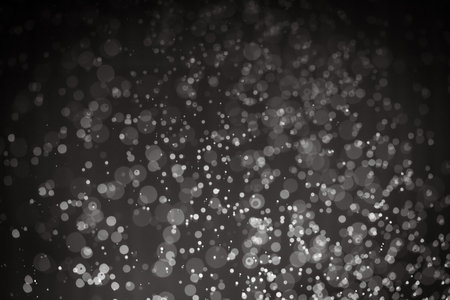 Abstract black bokeh with black backgroundの写真素材