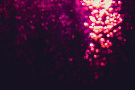 Abstract pink bokeh luxury with black backgroundの写真素材