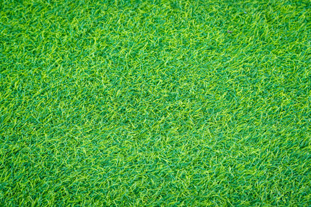Artificial grass for decorating the garden to look natural backgroundの写真素材