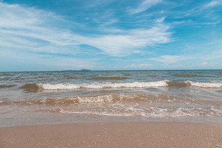 Sand on the beach with sea and blue sky nature backgroundの写真素材