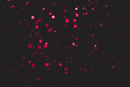 Abstract pink bokeh luxury with black backgroundの写真素材