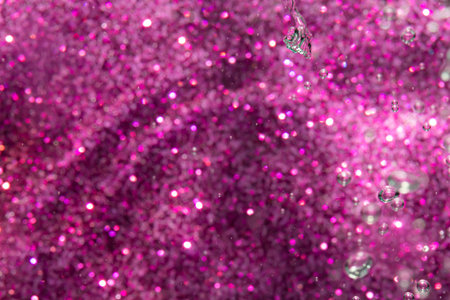 Fantasy abstract blur purple bokeh of lights colorful sparkle use for background