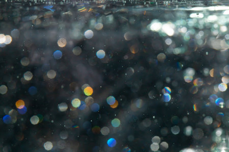 bokeh of lights from water on black background