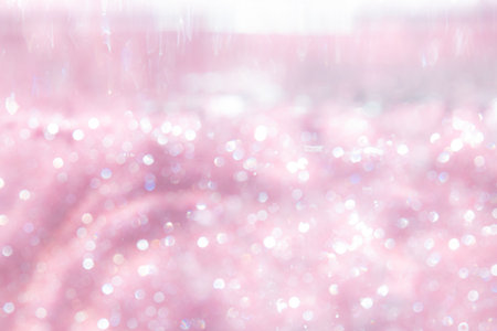 Pink abstract sparkles or glitter lights Defocused circles bokeh backgroundの写真素材