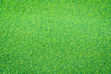 Artificial grass for decorating the garden to look natural backgroundの写真素材