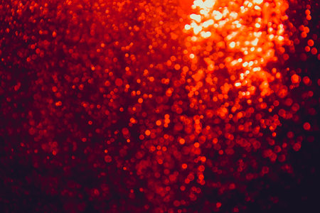 Abstract red bokeh luxury with black backgroundの写真素材