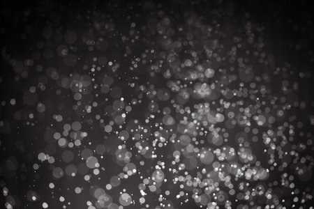 Abstract black bokeh with black backgroundの写真素材