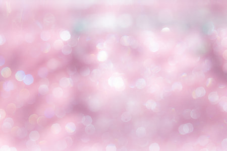 Pink abstract sparkles or glitter lights Defocused circles bokeh backgroundの写真素材