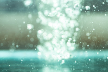 Bokeh of water on the background blurred the natural blue and white. Bokeh colorful glows sparkle beautiful Valentines Day concept. New year day and Christmas'dayの写真素材