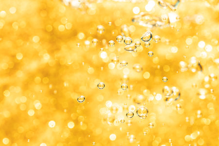 Abstract gold bokeh defocus glitter of light blur backgroundの写真素材
