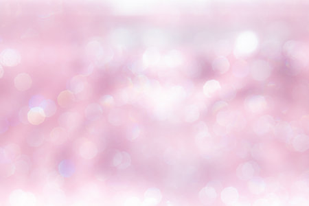 Pink abstract sparkles or glitter lights Defocused circles bokeh backgroundの写真素材