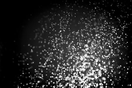 beautiful abstract black bokeh with black backgroundの写真素材